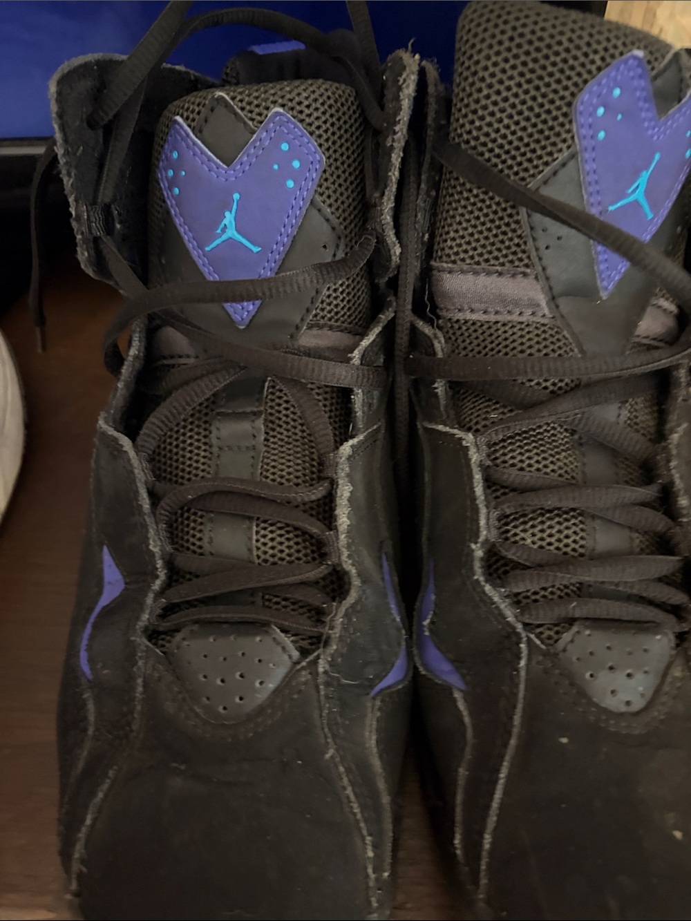 Jordan Black and Purple High-Top Sneakers with Teal Jumpman